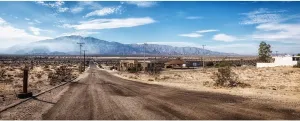 AOFOTO 15x8ft Western Dry Arid Area Old Town Village Backdrop for Photography Highway Route 66 Plateau Snow Mountain Nature Landscape Background Men Boy Adult Travel Portrait Photo Studio Props