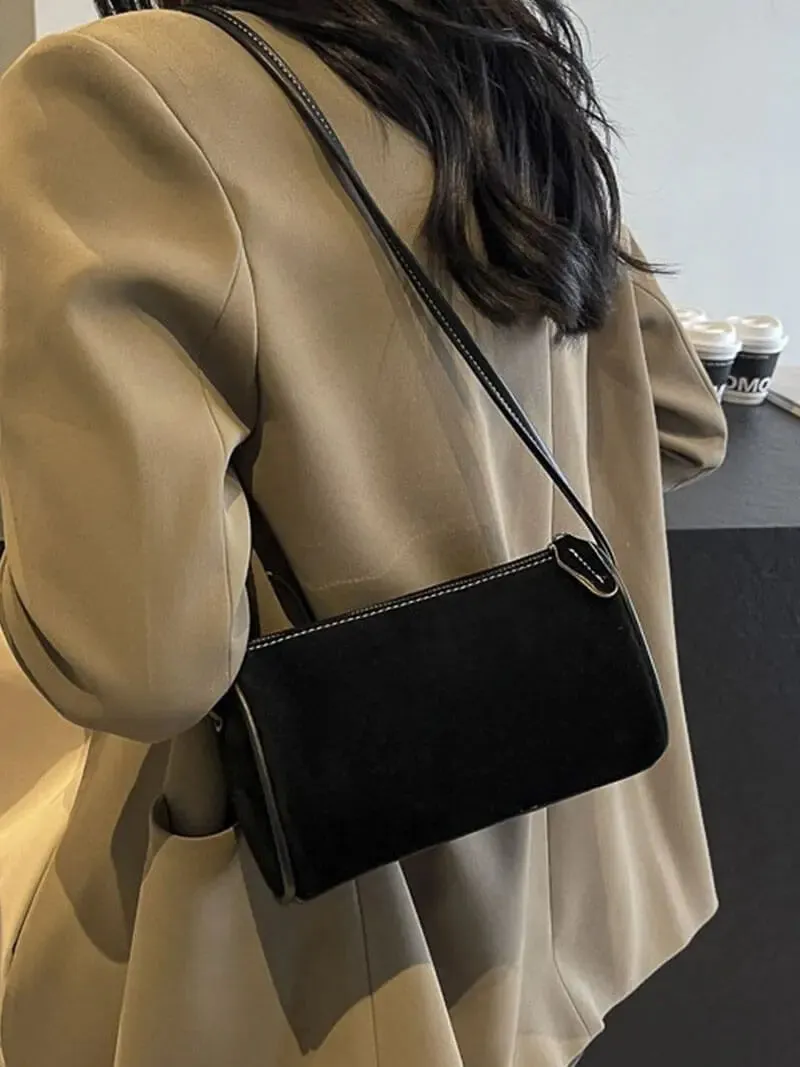 Chic Suede Barrel Bag – Compact and Timeless